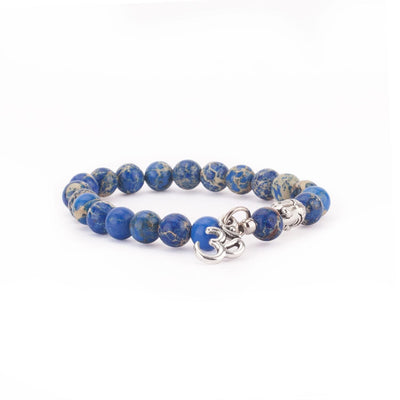 Braccialetto elasticizzato di perline di diaspro blu con charme (pendente) simbolo 'OM'
