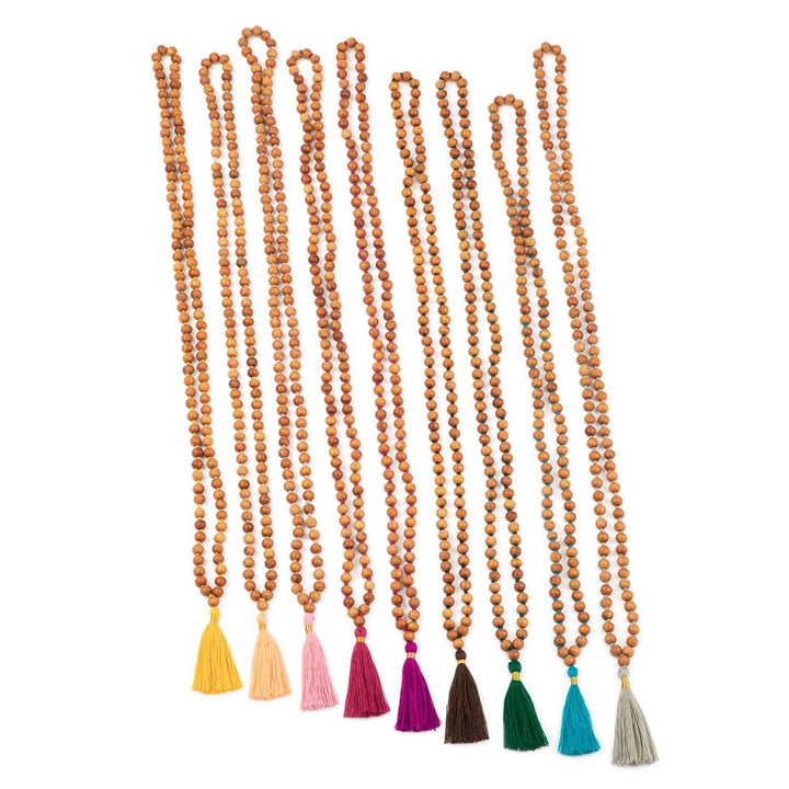 Mala in grani di legno di sandalo, profumato, nappine in coloratissime varietà