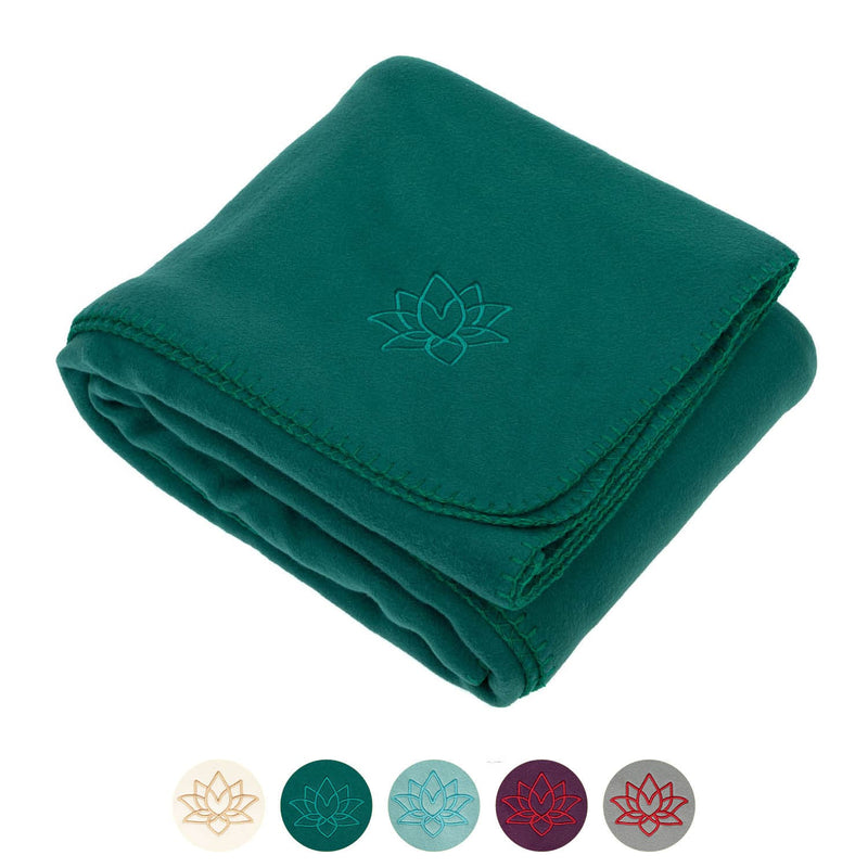 coperta per yoga asana ripiegata color verde foresta con  cerchietti dei vari colori
