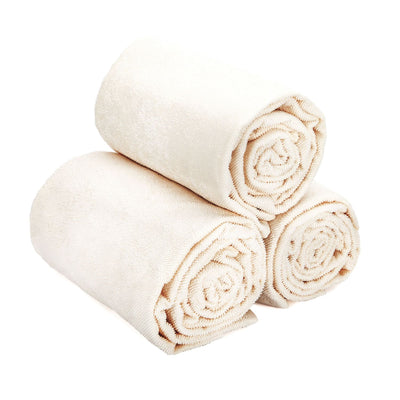 Asciugamano in cotone color ecru per trattamenti estetici e massaggi 75x200 arrotolati