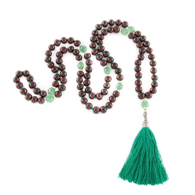 Mala in legno di rosa e onice verde, annodato ogni grano singolarmente, doppio filo. Nappina color verde smeraldo