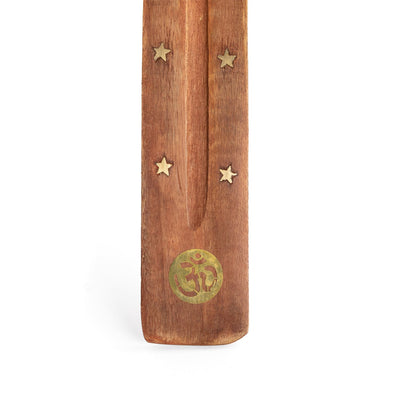 Portaincenso in legno con inserti metallo dorato, qui  raffigurato 'OM' in dettaglio